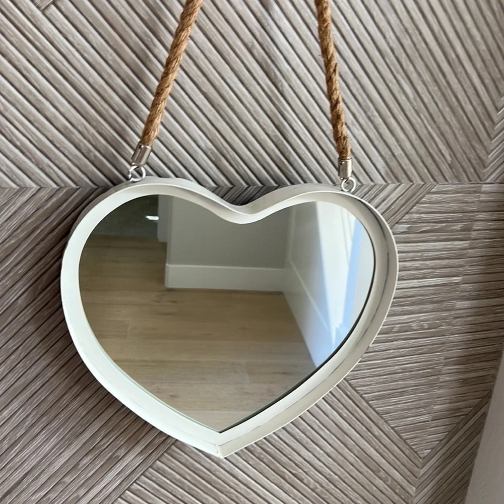 White hanging heart mirror on a rope. Coastal.